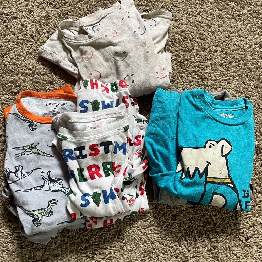 Three pjs and 2 shirts